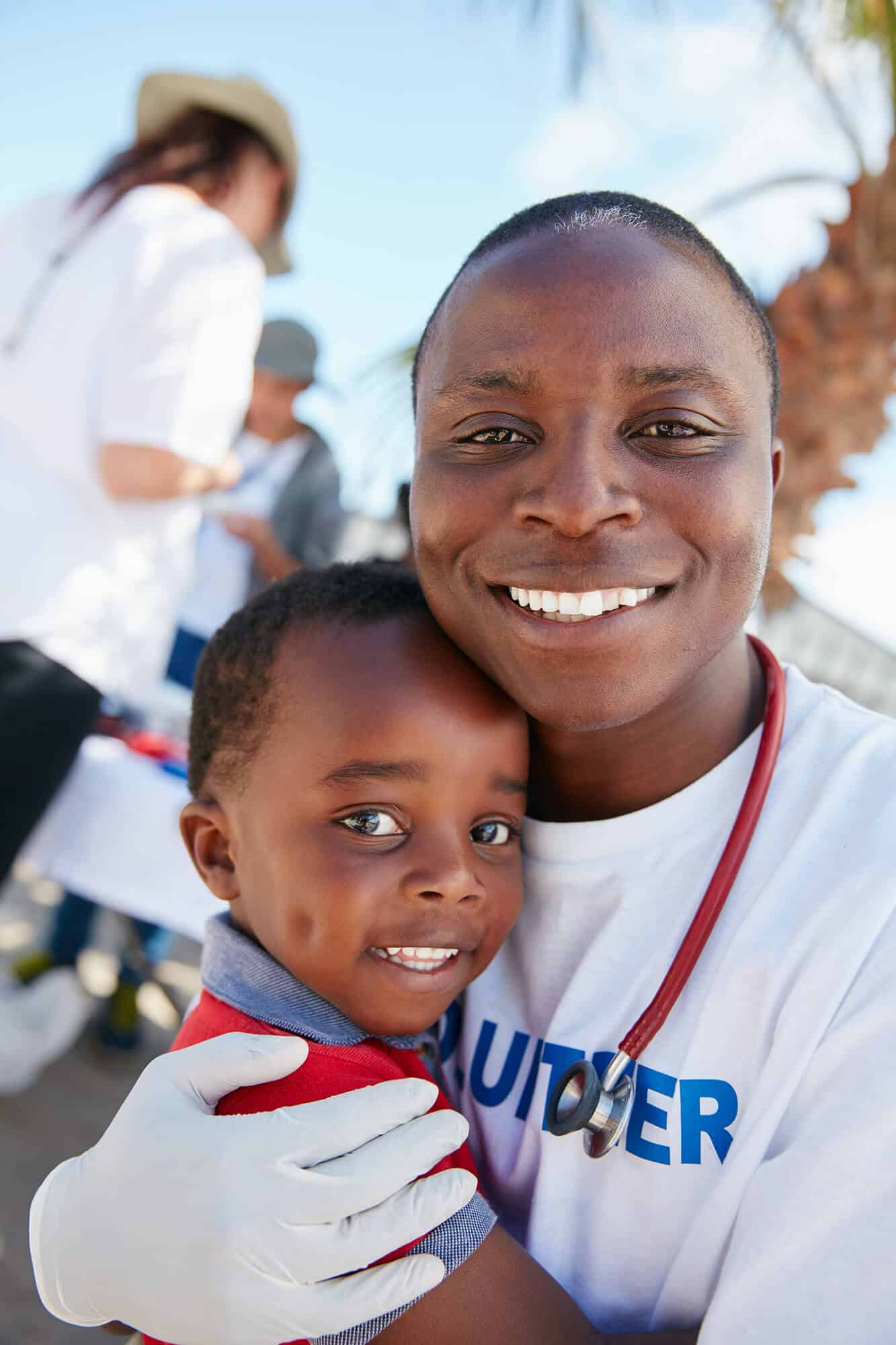 portrait-of-a-caring-volunteer-doctor-giving-check-2023-11-27-05-19-52-utc.jpg